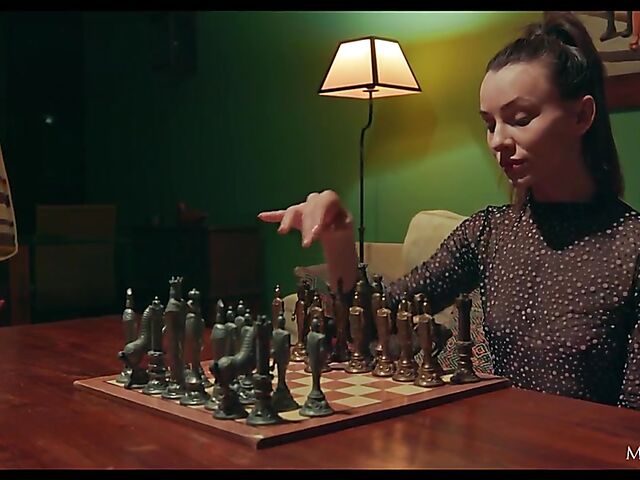 Bored Adel Morel playing chess alone and fingering herself in the evening