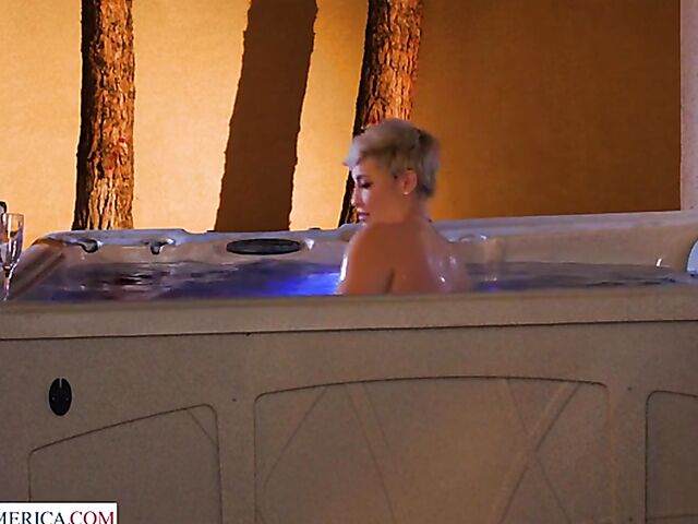 Short hair MILF with big melons Ryan Keely relaxing in a hot tub and fucking a peeping boy