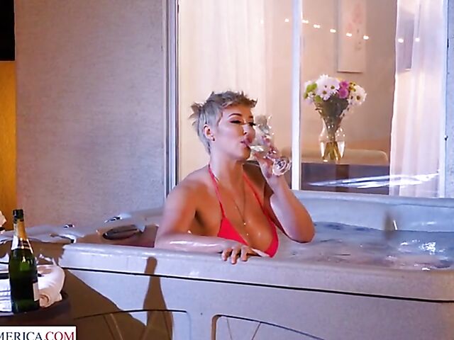 Short hair MILF with big melons Ryan Keely relaxing in a hot tub and fucking a peeping boy