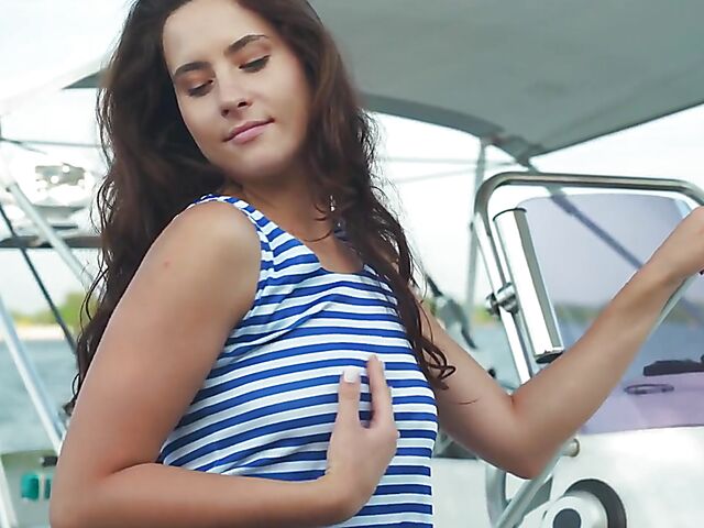 Sailor girl Mara Blake's outdoor solo posing on a boat