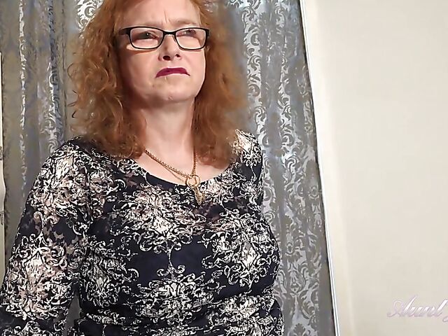 Mature glasses solo with red-haired Fiona masturbating in stockings