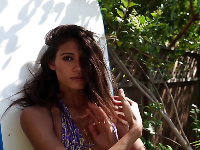 Exotic bikini babe Hanna Le gets nude in the garden