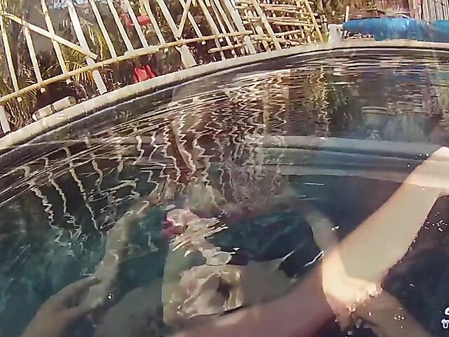 Taylor Dare takes off her pink bikini and poses nude underwater