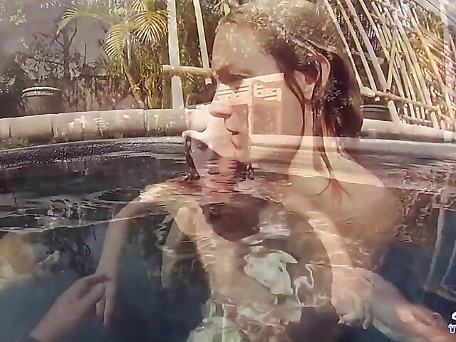 Taylor Dare takes off her pink bikini and poses nude underwater