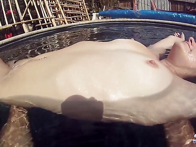 Taylor Dare takes off her pink bikini and poses nude underwater