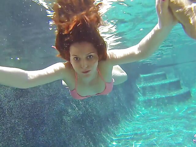 Emma Evins - Redheaded bikini babe's underwater training