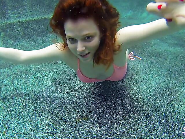 Emma Evins - Redheaded bikini babe's underwater training