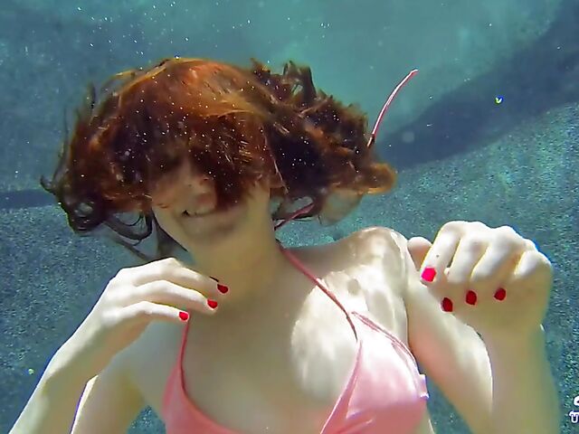 Emma Evins - Redheaded bikini babe's underwater training