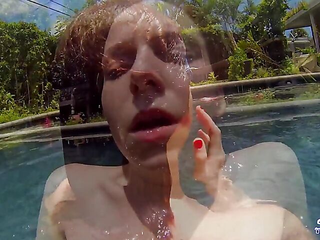 Emma Evins - Redheaded bikini babe's underwater training