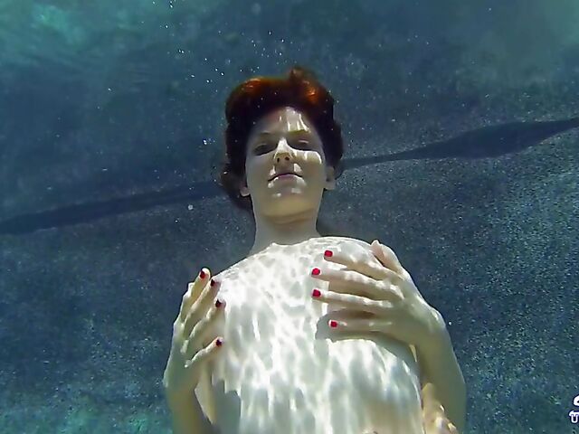 Emma Evins - Redheaded bikini babe's underwater training