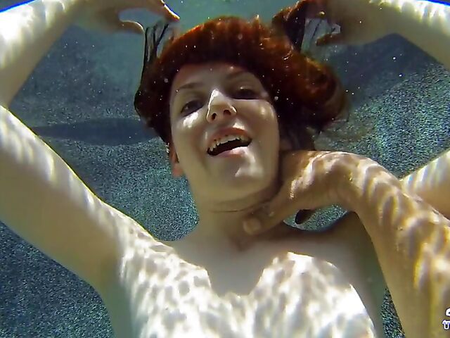 Emma Evins - Redheaded bikini babe's underwater training