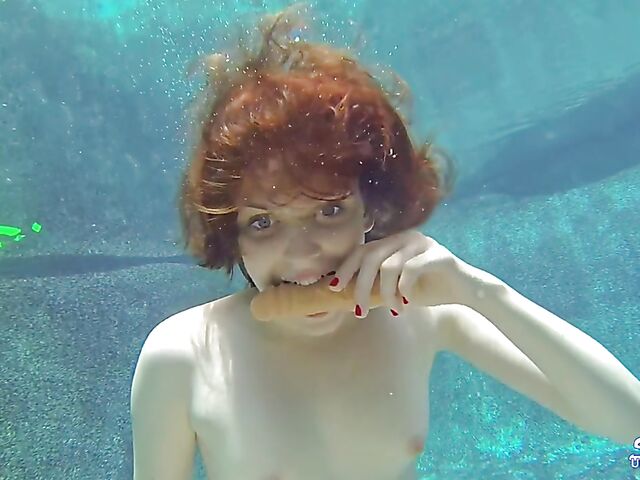 Emma Evins - Redheaded bikini babe's underwater training