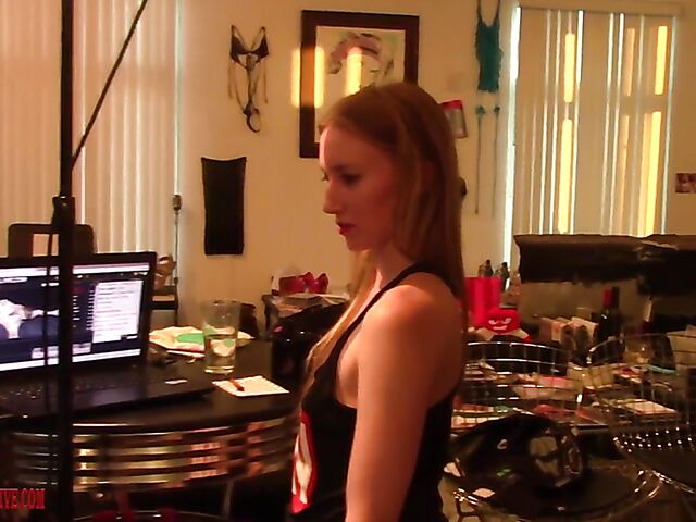 Behind the scenes sex in pink panties with redhead Abbey Rain