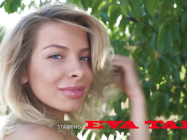 Erotic outdoor solo with Eva Tali in her barely there red bikini