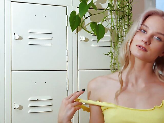 Beautiful blonde in yellow Roxy Shaw getting nude