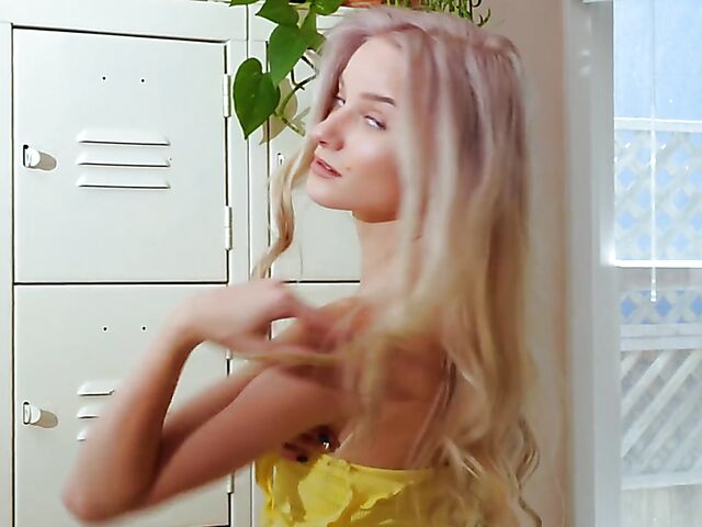 Beautiful blonde in yellow Roxy Shaw getting nude