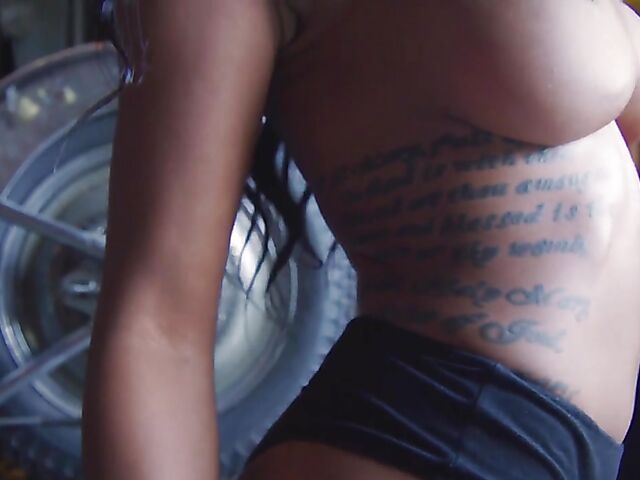 Sexy ebony biker babe and playboy model Harley Dean shows off her body