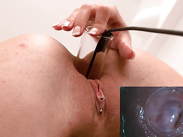 Flat chested Tabitha Poison with a camera inside pussy