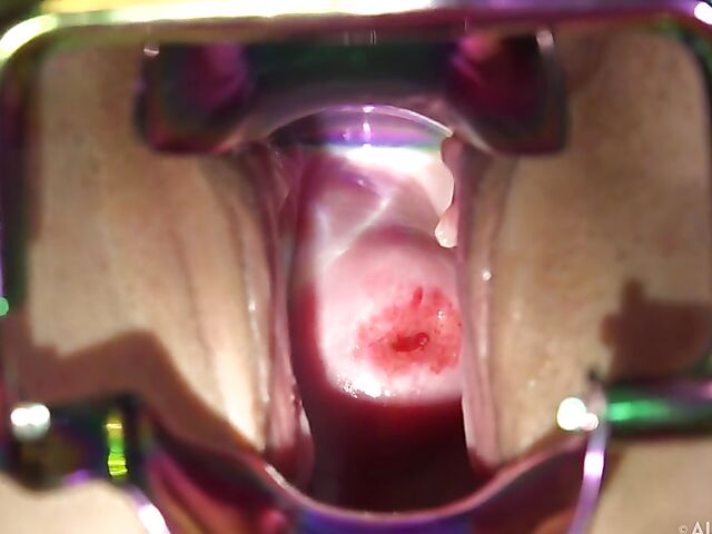 Cute babe in lingerie Kristen Scott displays her shaved spread pussy in the bedroom