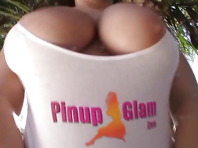 Busty model with big natural tits Satinee Capona gets wet under the palm tree