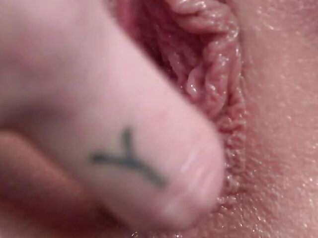 Shaved brunette Sydney Love puts a camera inside pussy in the back of a car