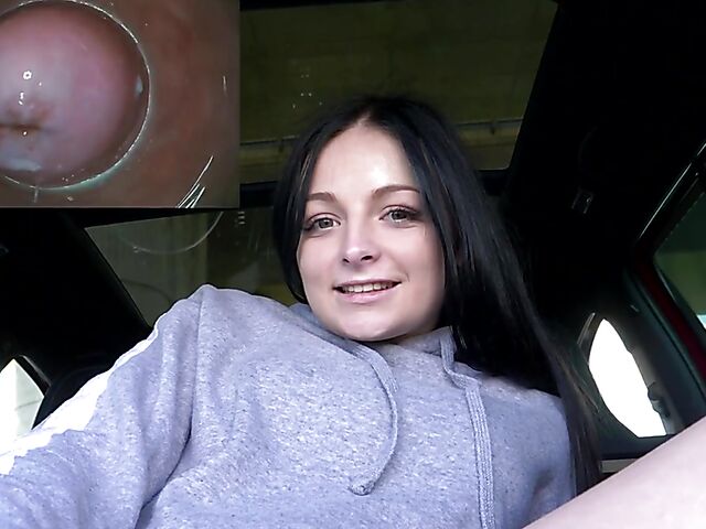 Shaved brunette Sydney Love puts a camera inside pussy in the back of a car