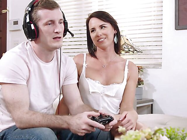 Cute MILF Riley Jacobs seduces a gamer boy