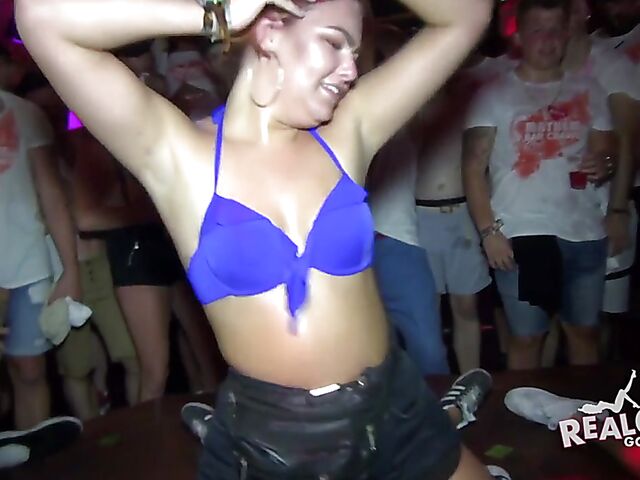 Wild party girls get naked in the crowd