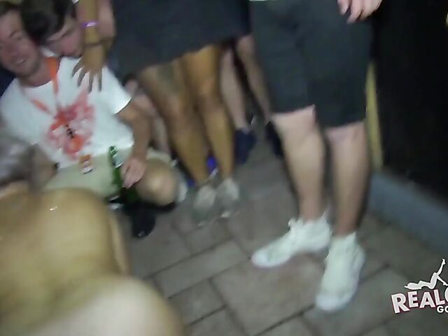 Wild party girls get naked in the crowd
