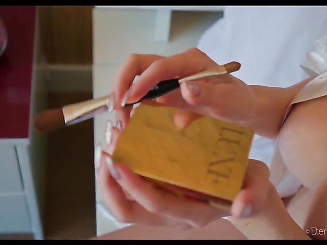 Maible puts her big natural tits and shaved snatch on display in the morning