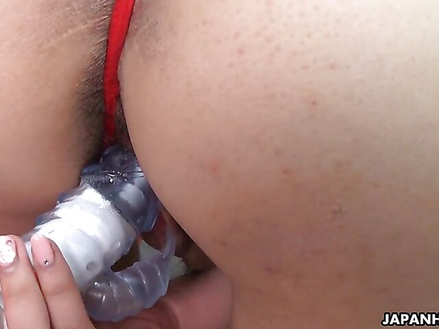 Japanese nurse Yui Nozomi caught toying her twat