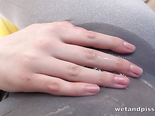 Shaved brunette Keira K wetting pants and dildoing herself