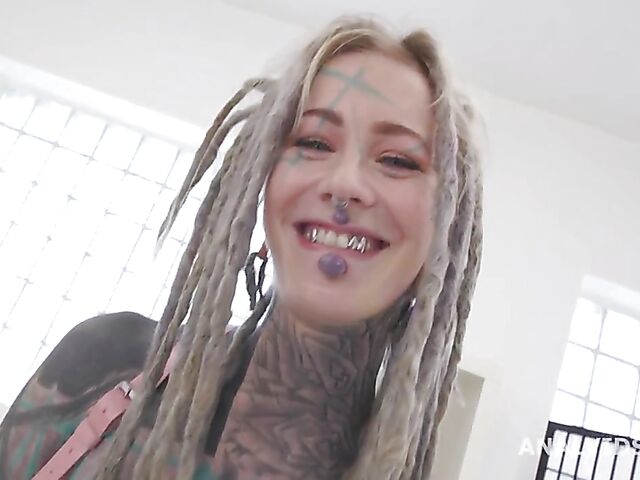 Heavily tattooed anal slut Anuskatzz takes four and two in the ass at once