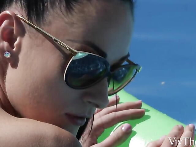 Lesbian pool fun on a hot day with Cherry Kiss and Nicole Smith