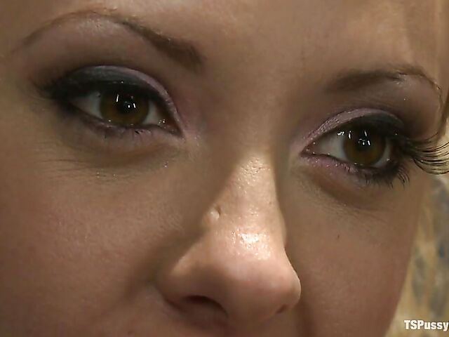 Tranny cheerleader TS Foxxy fucks Courtney Taylor's boobs and pussy in the locker room