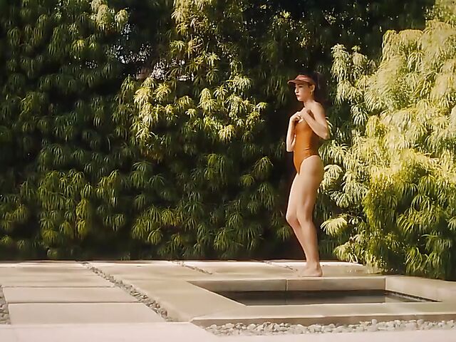 Outdoor solo by the pool with playboy glamour models