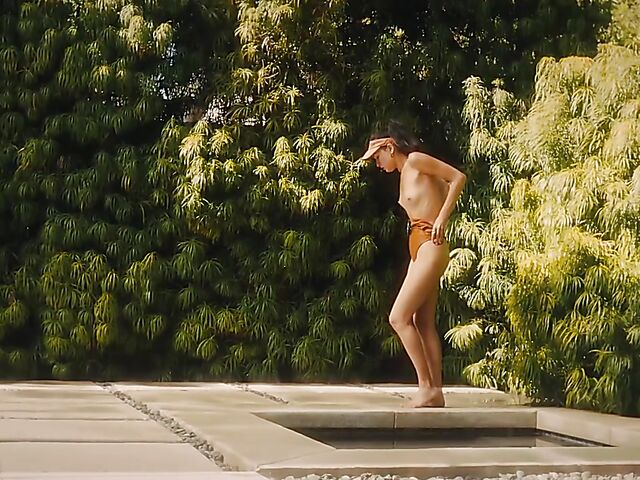 Outdoor solo by the pool with playboy glamour models