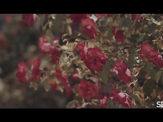 Flowers, summer heat, and sensual outdoor sex with Mona Blue