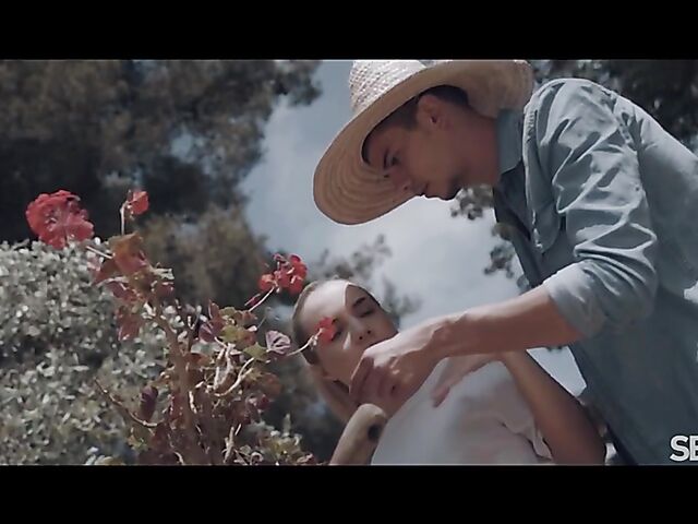 Flowers, summer heat, and sensual outdoor sex with Mona Blue