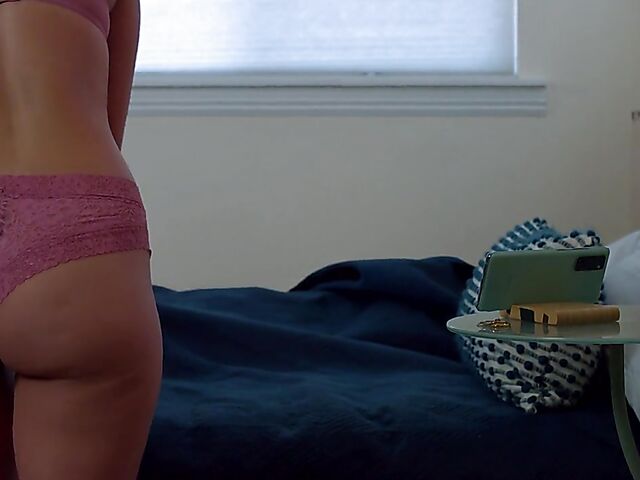 Brunette nurse Luz masturbating next to a sleeping guy in his bed