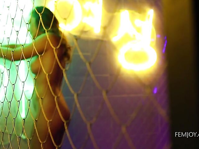 Sexy and tempting Emerald's erotic solo in neon