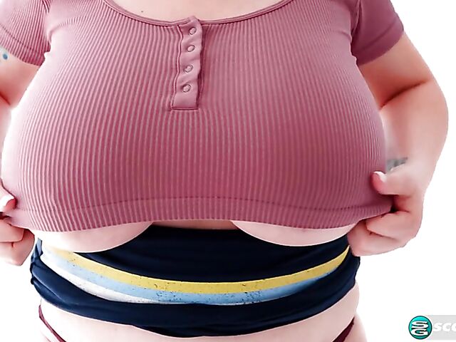 Busty chubby woman Demora Avarice changing clothes and showing off her heavy hangers