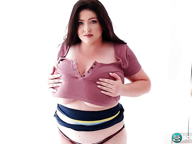 Busty chubby woman Demora Avarice changing clothes and showing off her heavy hangers