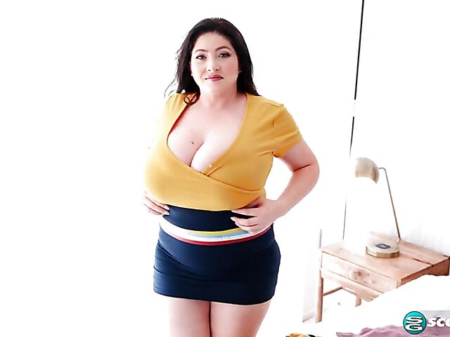 Busty chubby woman Demora Avarice changing clothes and showing off her heavy hangers