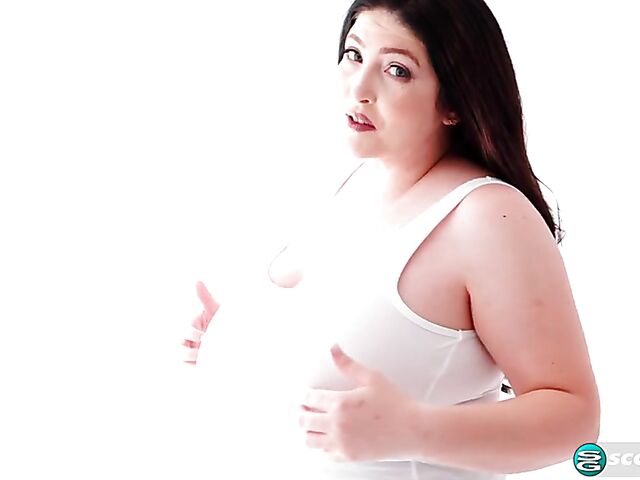 Busty chubby woman Demora Avarice changing clothes and showing off her heavy hangers