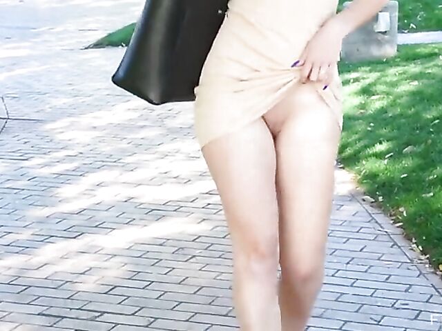 Cute brunette April A shows her pussy in public and takes her toys