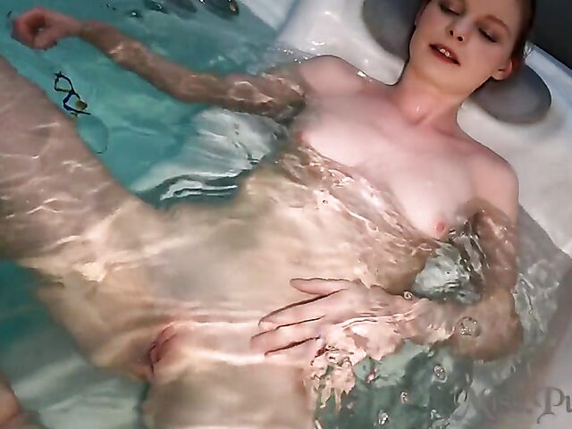 Underwater masturbation with a glass dildo in the hot tub with Miss Pussy Cat