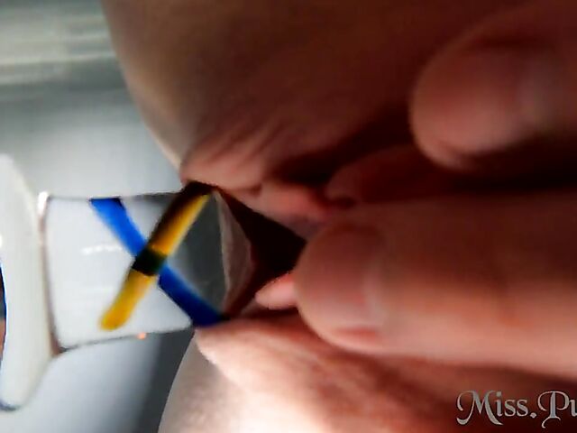 Underwater masturbation with a glass dildo in the hot tub with Miss Pussy Cat