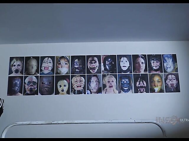 Pale skin girl Brooke Johnson in metal bondage