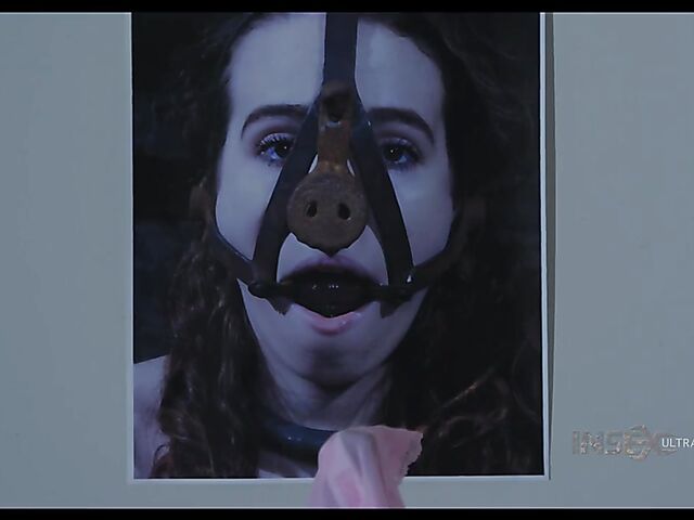Pale skin girl Brooke Johnson in metal bondage